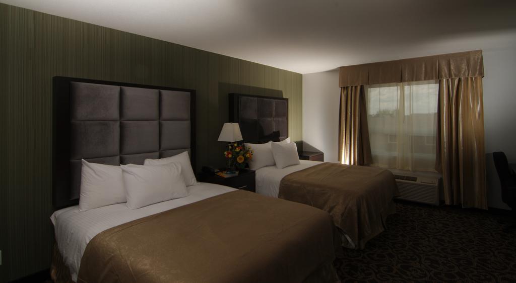 Paradise Inn And Suites Redwater Номер фото